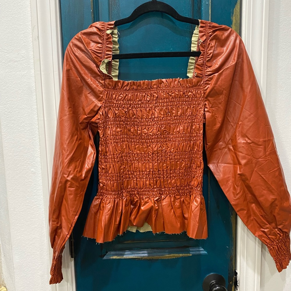 Rustic orange leather blouse